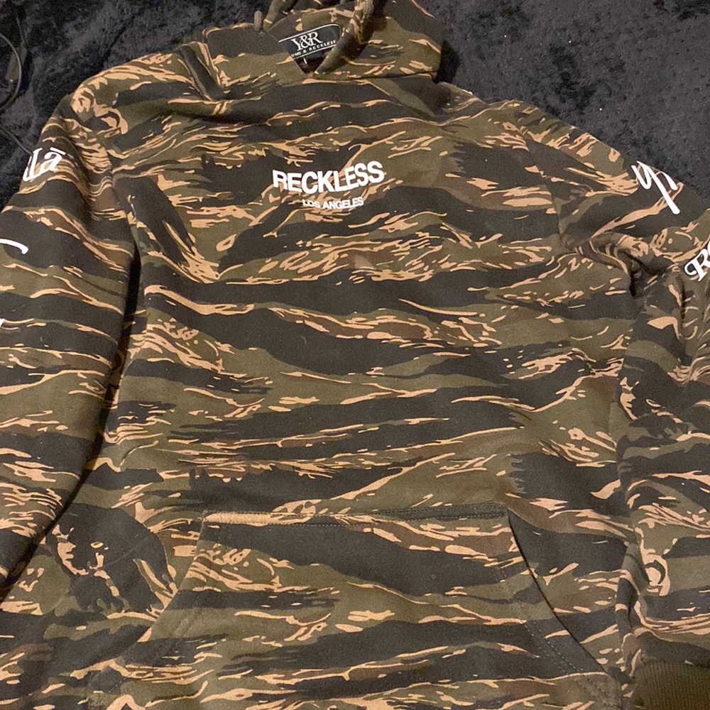 Young and reckless hoodie , good condition size S .